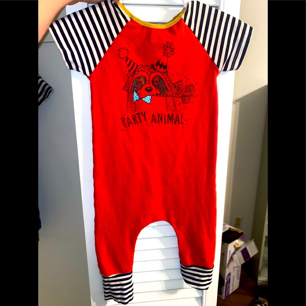 6-12 mo party raccoon rag. Excellent condition!